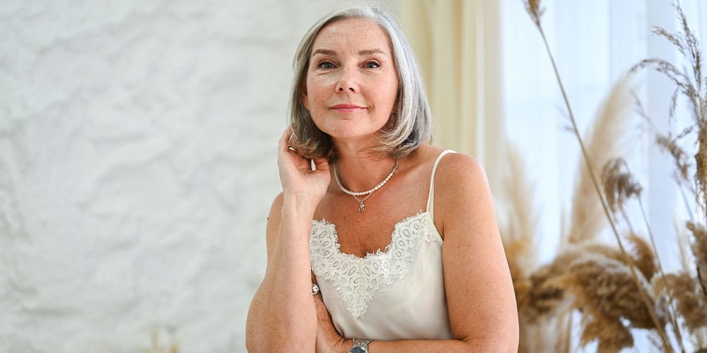 woman after getting treatment for Breast Implant Illness in Bloomfield Township