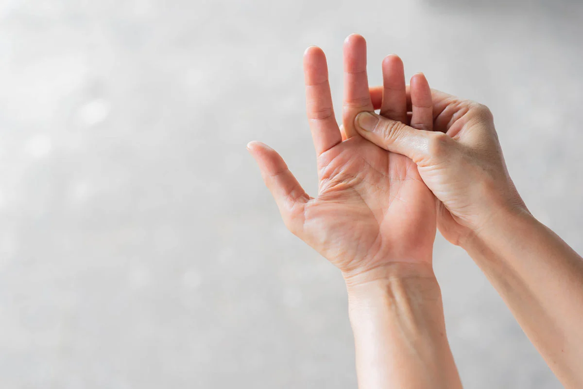Two hands demonstrating open palm with fingers extended and together