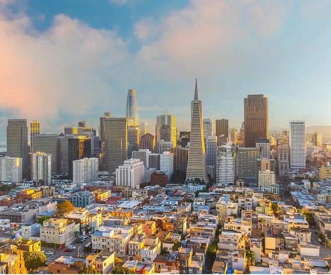 San Francisco skyline at golden hour with downtown skyscrapers and residential buildings