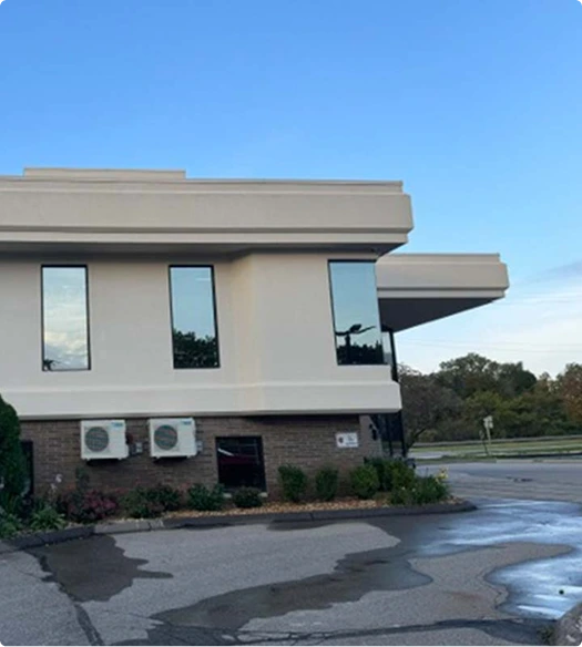 Contemporary surgical practice building with geometric design and large windows